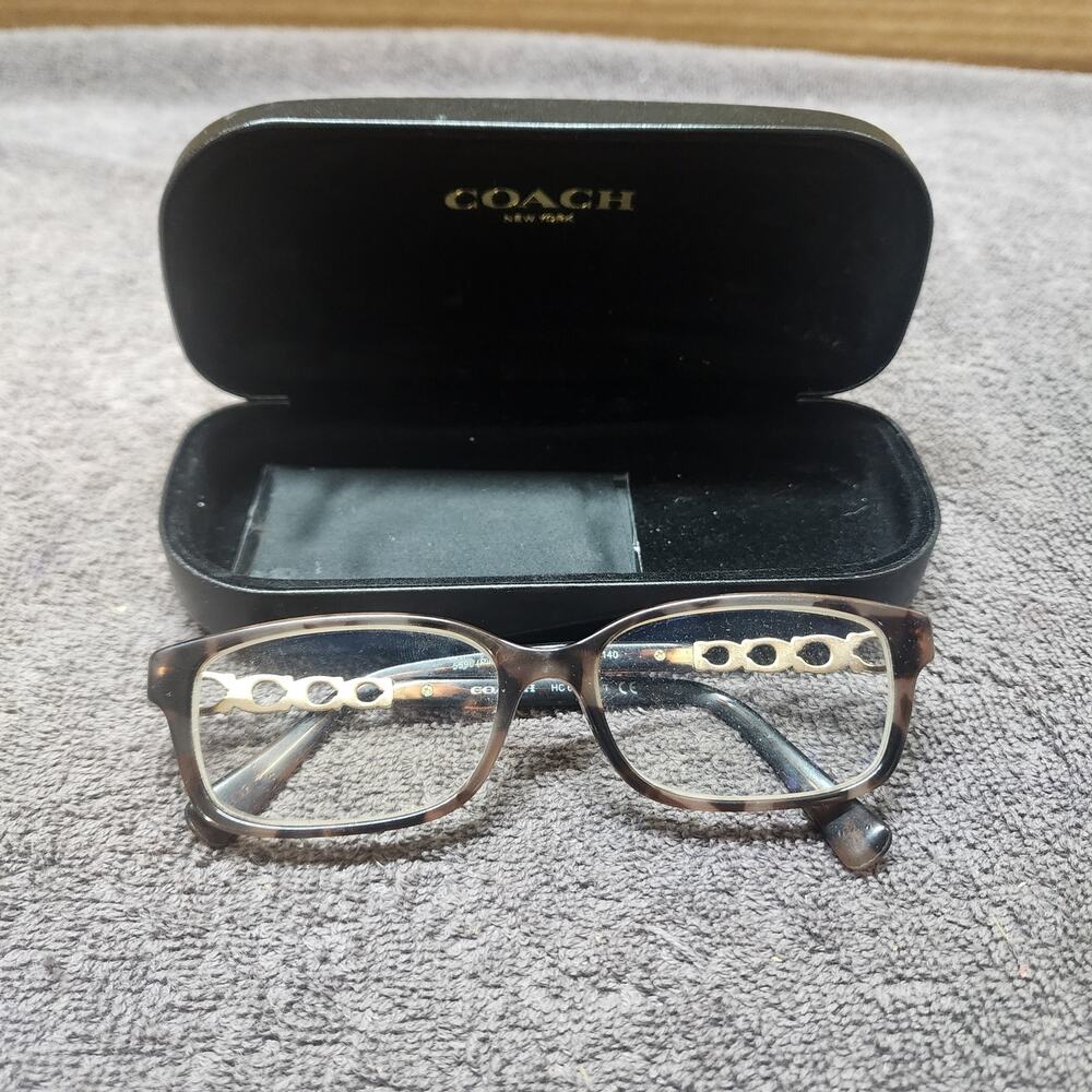 Coach eyeglasses and case. Glasses are pre-owned prescription need adjusting b34